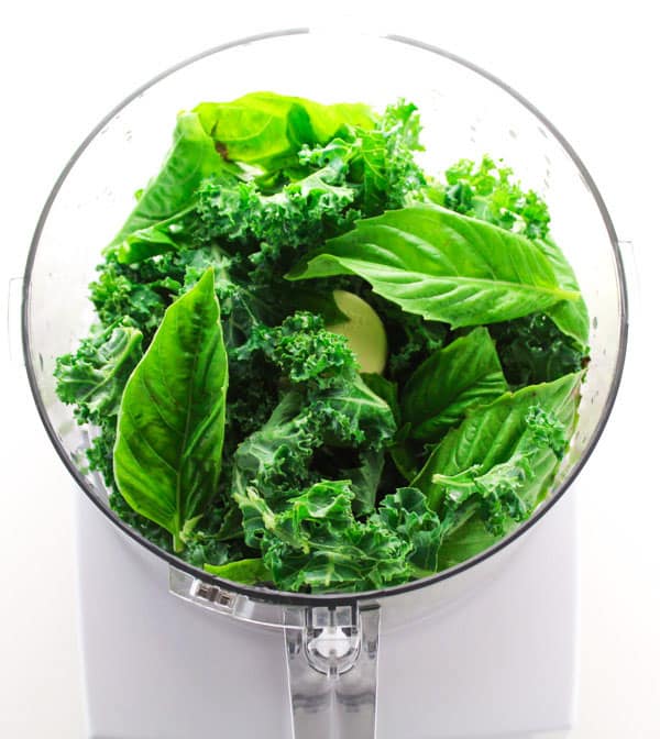 kale and basil in a food processor
