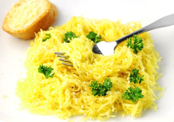 This Garlic Parmesan Spaghetti Squash is super easy to make and tastes so delicious! This is a great Gluten Free alternative to regular noodles.
