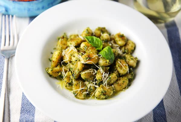 This Pan Fried Gnocchi with Basil Pesto comes together in less than 10 minutes and is so delicious! Perfect for those busy weeknights!