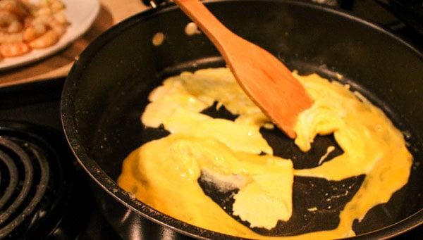Scrambling eggs in a pan
