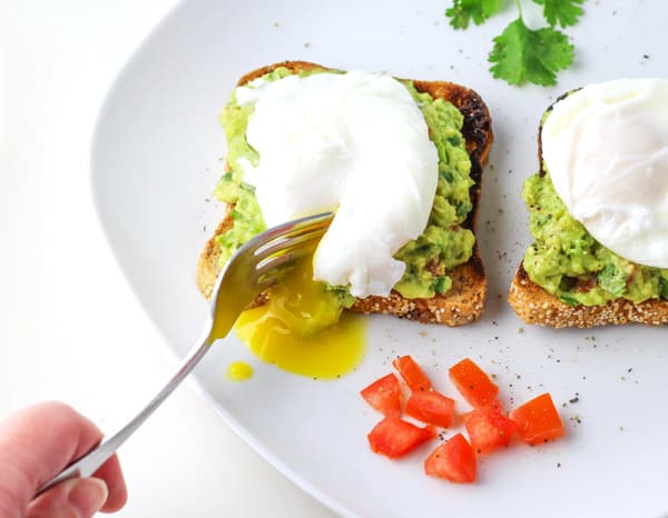 Cilantro Tomato Avocado Smash With Poached Eggs ~ This is such a simple and delicious breakfast to make!