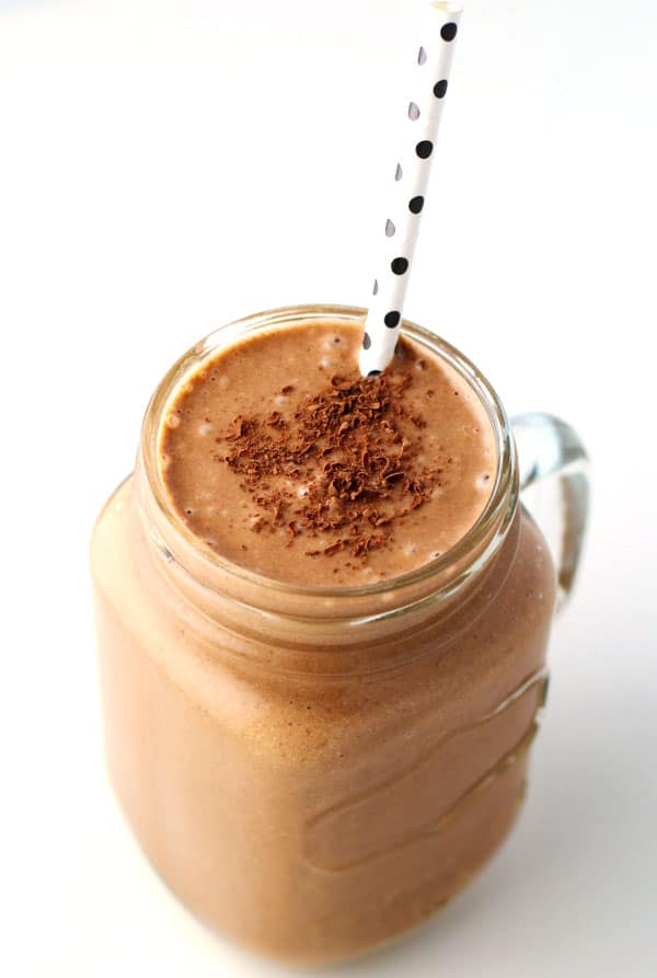Healthy Chocolate Peanut Butter Smoothie made with Vanilla Almond Milk, Cacao Powder, Peanut Butter, and Bananas. This is so delicious and is perfect for whenever you want a healthy treat!