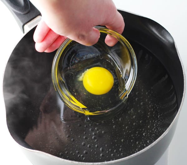 putting egg in water