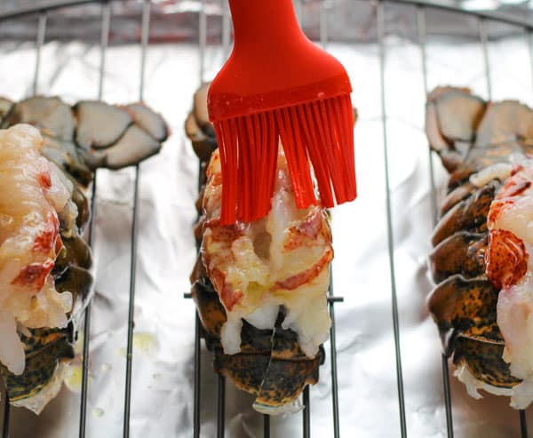 Brushing Lobster tails with butter