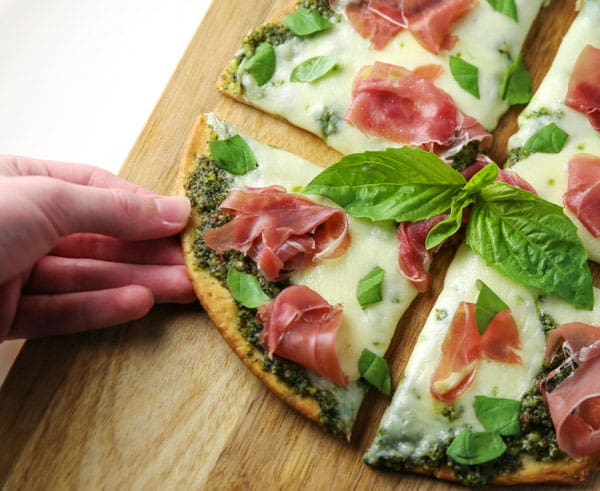 This Prosciutto Basil Buffalo Mozzarella Pizza (Gluten Free) is super easy to make and so full of flavor! This will be your new favorite Pizza!