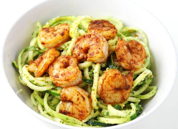 Spicy Shrimp With Basil Lime Pesto Zoodles ~ This can be made in less than 10 minutes and is so delicious! We spiralized Zucchini to make this a low carb, gluten free, 'noodle' alternative!