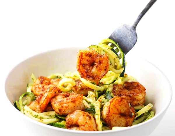 Spicy Shrimp With Basil Lime Pesto Zoodles ~ This can be made in less than 10 minutes and is so delicious! We spiralized Zucchini to make this a low carb, gluten free, 'noodle' alternative!