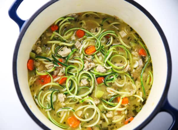 Healthy Turkey Zoodle Soup on a dutch oven