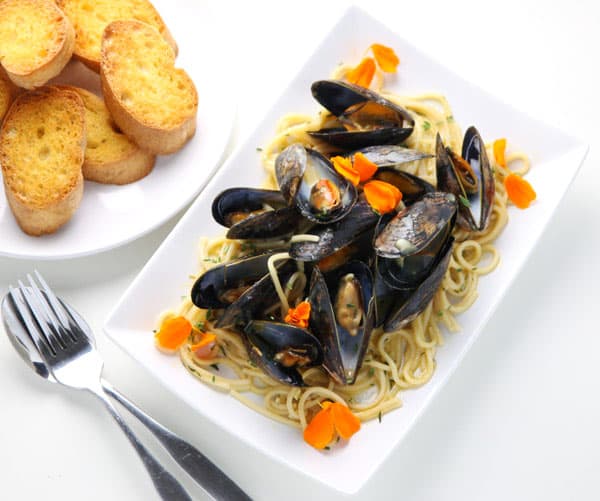 #ad - These White Wine Mussels With Pasta (Gluten Free) come together in less than 30 minutes and all in one pot! This has to be one of the easiest, delicious meals I've ever made! | Tastefulventure.com made in partnership with @NinjaKitchen #NinjaDeliciousDoneEasy #NinjaPartner
