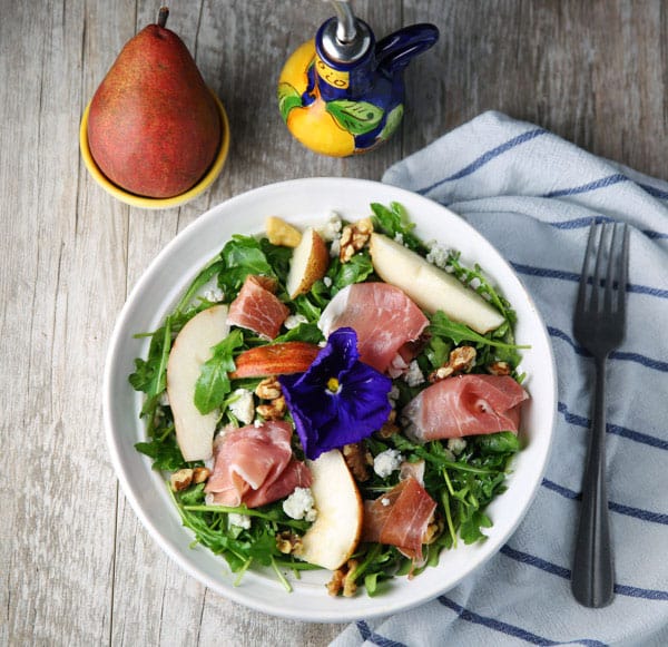 This Arugula Prosciutto Pear Salad with Gorgonzola and Walnuts has the perfect harmony of flavors! This probably one of the most delicious salads I've ever had!