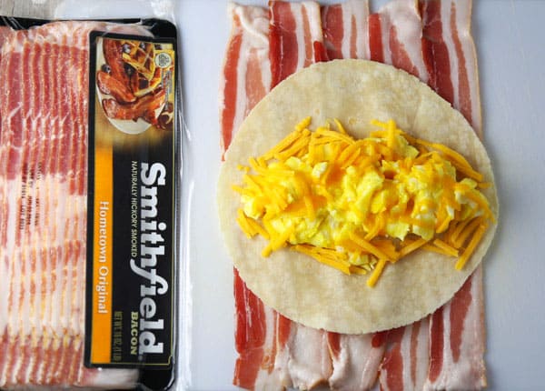 #ad Putting a new spin on Breakfast with this easy Bacon Wrapped Breakfast Burrito! Tastefulventure.com made in partnership with @SmithfieldBrand #BreakfastReimagined