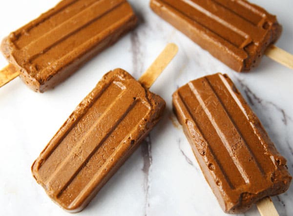 These Healthy Chocolate Popsicles are made with simple, fresh, and organic ingredients. It's definitely a treat you can feel good about eating!