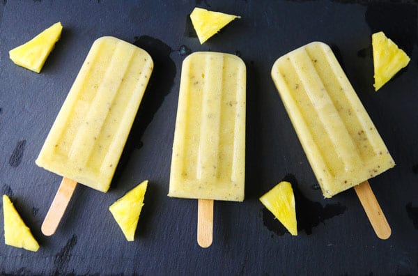 Pineapple Mango Chia Seed Popsicles made with simple healthy ingredients! You can feel good about eating this yummy frozen treat!