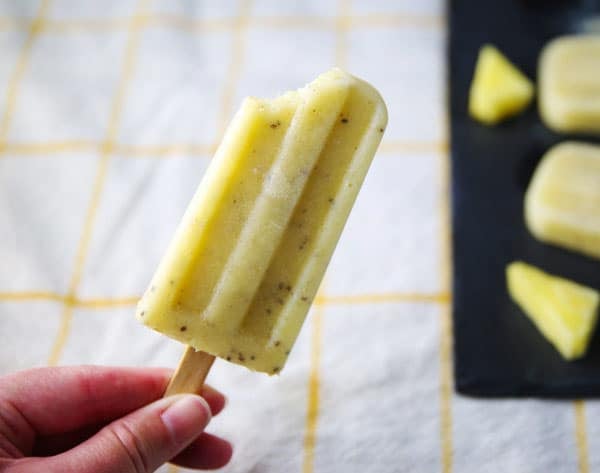 Pineapple Mango Chia Seed Popsicles made with simple healthy ingredients! You can feel good about eating this yummy frozen treat!