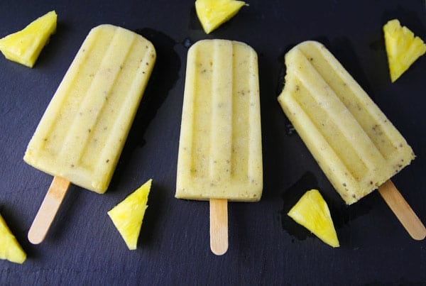 Pineapple Mango Chia Seed Popsicles made with simple healthy ingredients! You can feel good about eating this yummy frozen treat!