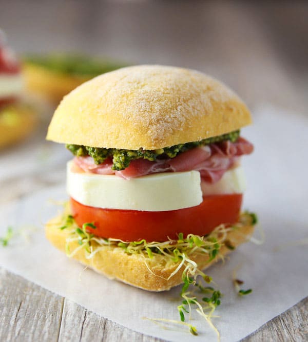 Prosciutto Mozzarella Tomato Ciabatta with Basil Pesto - Tastefulventure