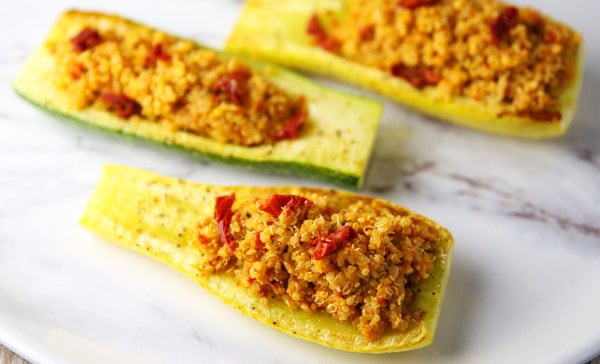 Sun-Dried Tomato Pesto Quinoa with Roasted Zucchini - This is so light, refreshing, and loaded with flavor! Perfect as a meal or a side dish!