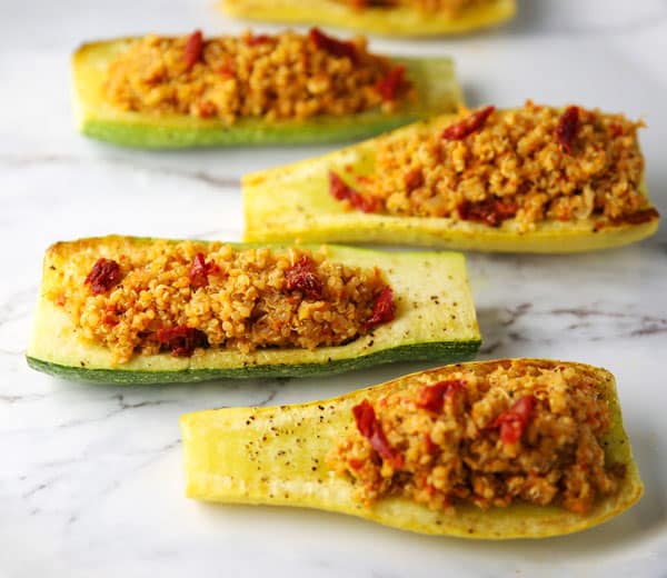 Sun-Dried Tomato Pesto Quinoa with Roasted Zucchini - This is so light, refreshing, and loaded with flavor! Perfect as a meal or a side dish!