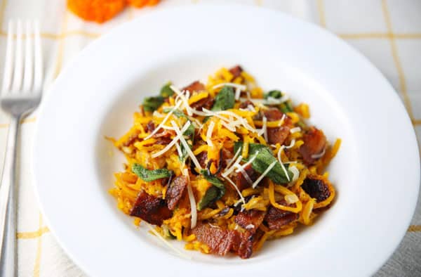 Butternut Squash Noodles with Bacon and Sage - This is a great gluten free alternative to noodles by spiralizing Butternut Squash into noodles! The flavors of the Squash with the Bacon and Sage are totally drool worthy!