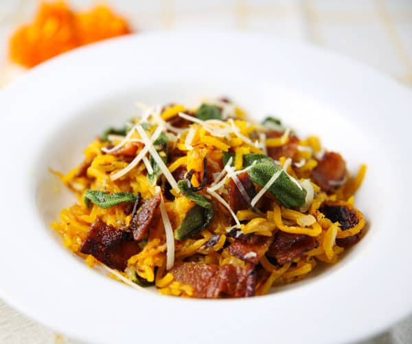 Butternut Squash Noodles with Bacon and Sage - This is a great gluten free alternative to noodles by spiralizing Butternut Squash into noodles! The flavors of the Squash with the Bacon and Sage are totally drool worthy!