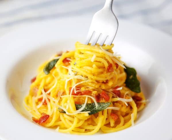 This Butternut Squash Spaghetti with Fried Sage and Pancetta is so easy to make. Using a homemade Butternut Squash pasta sauce, tossed with the Spaghetti, Fried Sage and Pancetta... Wow, so savory!