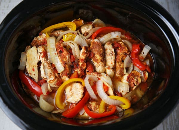 These Slow Cooker Chicken Fajitas are so easy to make and loaded with flavor! Perfect for those busy weeknights!