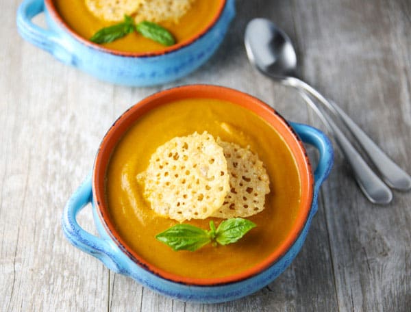 This Creamy Tomato Basil Soup with Parmesan Crisps is made with simple fresh ingredients. This soup is hearty, healthy, and so velvety!