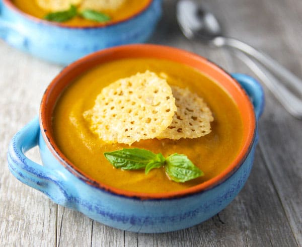 This Creamy Tomato Basil Soup with Parmesan Crisps is made with simple fresh ingredients. This soup is hearty, healthy, and so velvety!