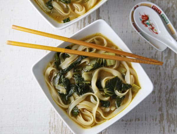 This Ginger Bok Choy Soup with Noodles is incredibly delicious and only takes about 15 minutes to make! #glutenfree #Asianfood #vegetarian #soup #bokchoy #easyrecipes #dutchoven
