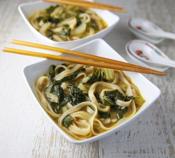 This Ginger Bok Choy Soup with Noodles is incredibly delicious and only takes about 15 minutes to make! #glutenfree #Asianfood #vegetarian #soup #bokchoy #easyrecipes #dutchoven