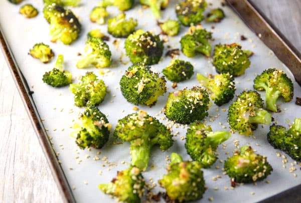 This Ginger Sesame Roasted Broccoli is slightly crispy, tender, and full of flavor! This is the perfect pairing to any Asian dish!