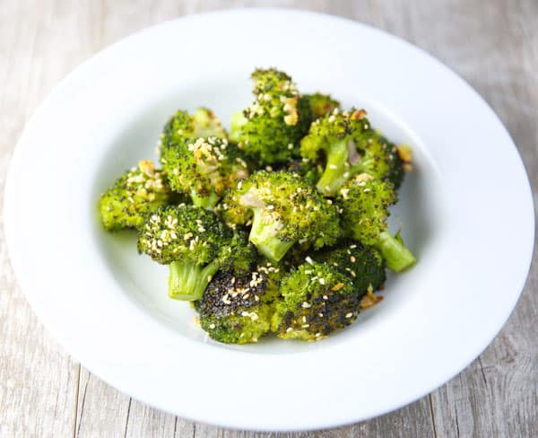This Ginger Sesame Roasted Broccoli is slightly crispy, tender, and full of flavor! This is the perfect pairing to any Asian dish!