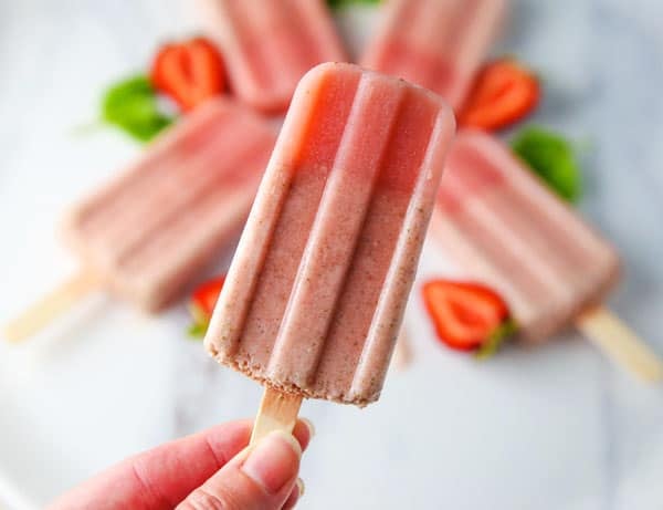 These Healthy Strawberry Mint Popsicles will be your new favorite summer treat! Made with simple fresh ingredients and dairy free!