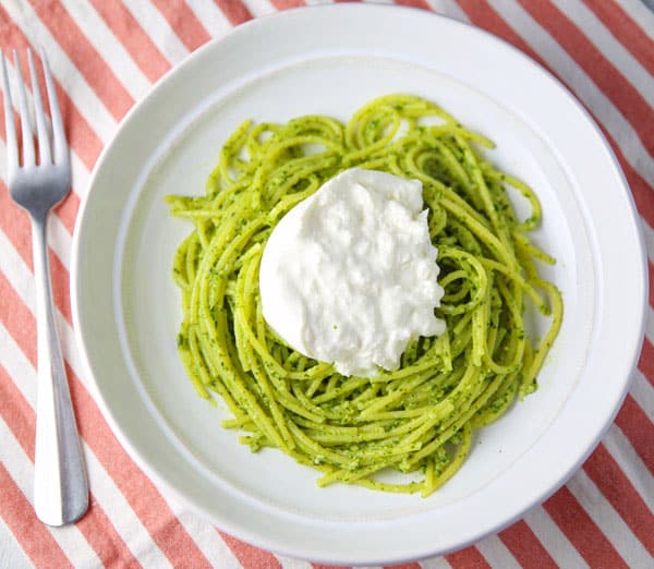 This Lemon Basil Pesto Spaghetti with Burrata comes together in about 10 minutes. So light, fresh, and creamy, this will be your new favorite summer pasta dish!