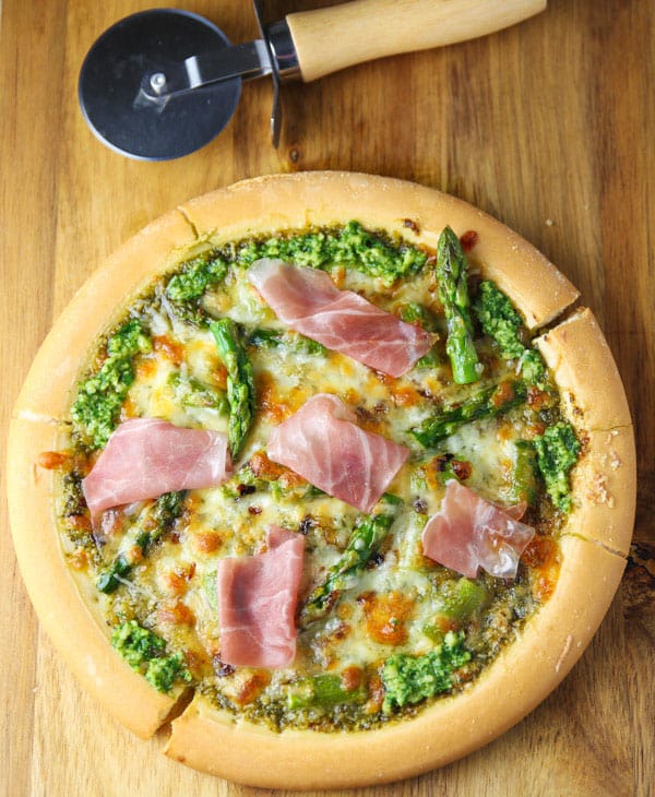 This Lemon Pesto Asparagus and Prosciutto Pizza is made with fresh ingredients and is incredibly savory! It's the perfect Springtime pizza!