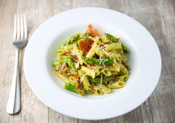 This Lemon Pesto Penne with Crispy Prosciutto and Asparagus comes together in about 20 minutes and is INCREDIBLY delicious! This could be the perfect Spring Time pasta!