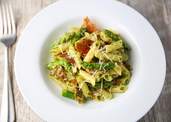 This Lemon Pesto Penne with Crispy Prosciutto and Asparagus comes together in about 20 minutes and is INCREDIBLY delicious! This could be the perfect Spring Time pasta!