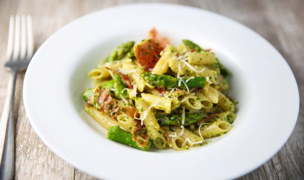 This Lemon Pesto Penne with Crispy Prosciutto and Asparagus comes together in about 20 minutes and is INCREDIBLY delicious! This could be the perfect Spring Time pasta!