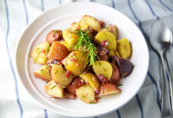 This Lemon Rosemary Prosciutto Potato Salad (No Mayo) comes together in about 15 minutes and is INSANELY delicious! Definitely a crowd favorite!