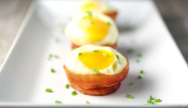 Over-Easy Eggs in Prosciutto Cups - Sweet Savory and Steph