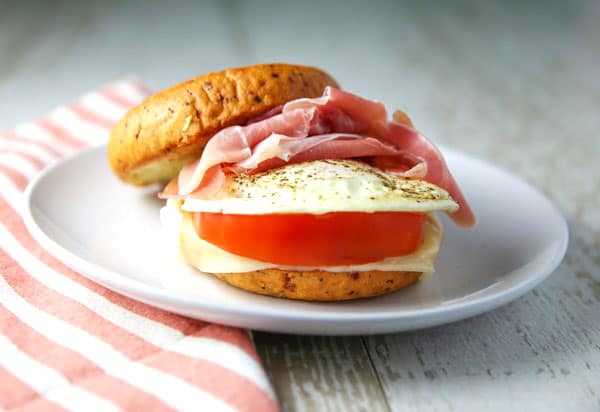 Breakfast just got a whole lot better with this Prosciutto Provolone Tomato and Egg Breakfast Bagel! #glutenfree #breakfast #brunch #bagel #breakfastbagel