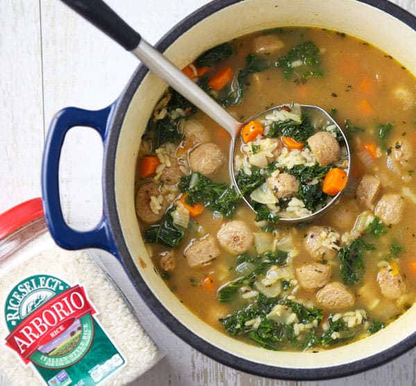 This Sausage and Kale Soup with Arborio Rice can be made in less than 30 minutes and is incredibly savory! This will be your new favorite soup! @Walmart and @RiceSelect #ad #UnforgettableRice #soup #dinner