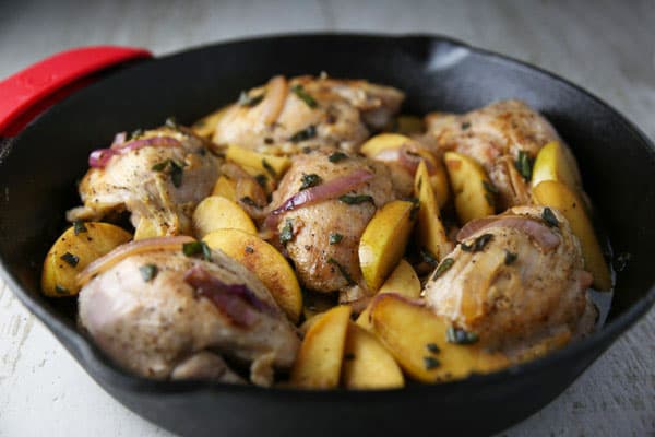 These Skillet Apple Chicken Thighs are an easy peasy weeknight dinner! The Chicken is so tender, juicy, and savory!