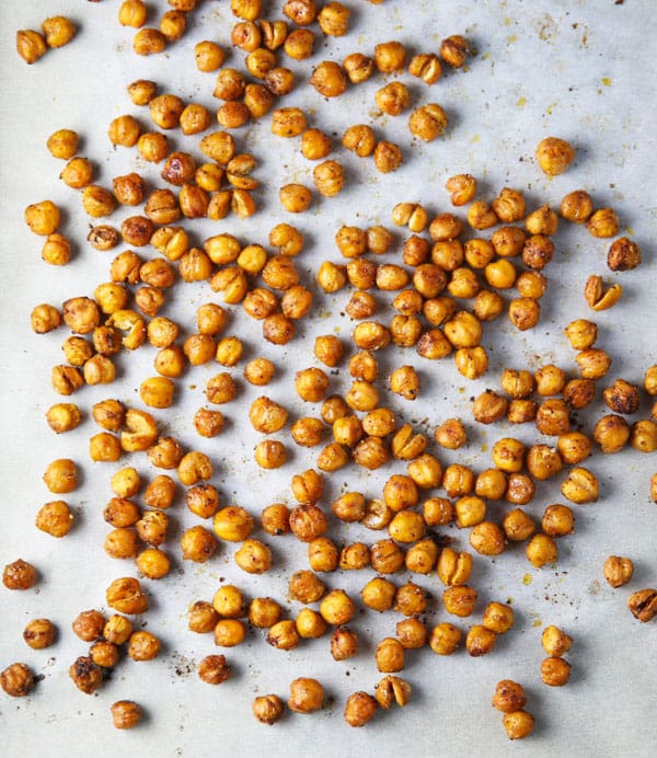 These Spicy Roasted Chickpeas are made with simple ingredients. This could be the perfect healthy snack!