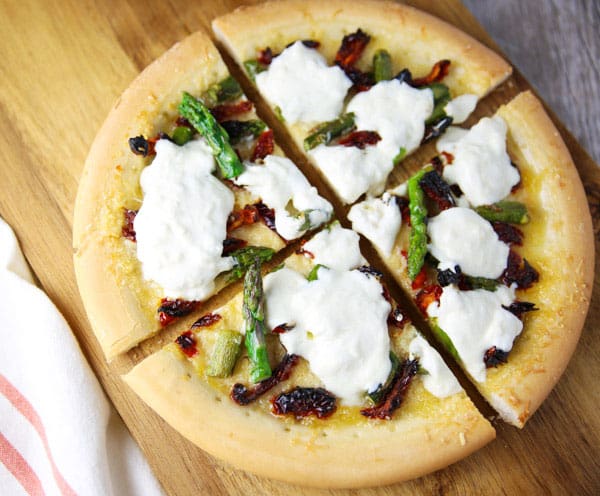 This Sun-Dried Tomato Asparagus and Burrata Pizza (Gluten Free) is made with simple fresh ingredients and is INSANELY delicious!