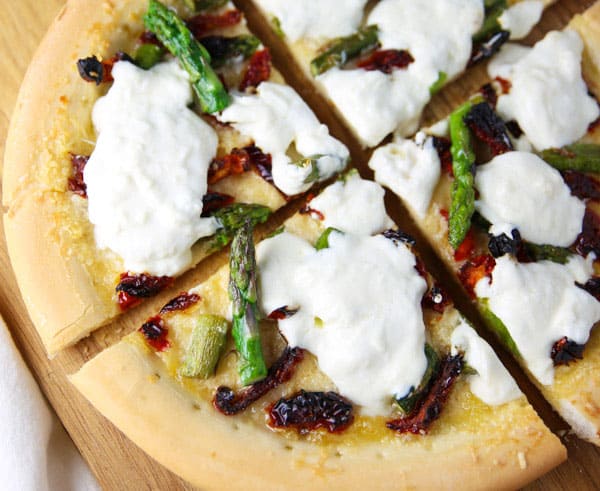 This Sun-Dried Tomato Asparagus and Burrata Pizza (Gluten Free) is made with simple fresh ingredients and is INSANELY delicious!
