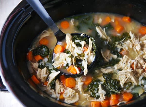 This Slow Cooker Lemon Chicken and Rice Soup with Kale is so healthy, hearty, and savory! This will be your new favorite soup!