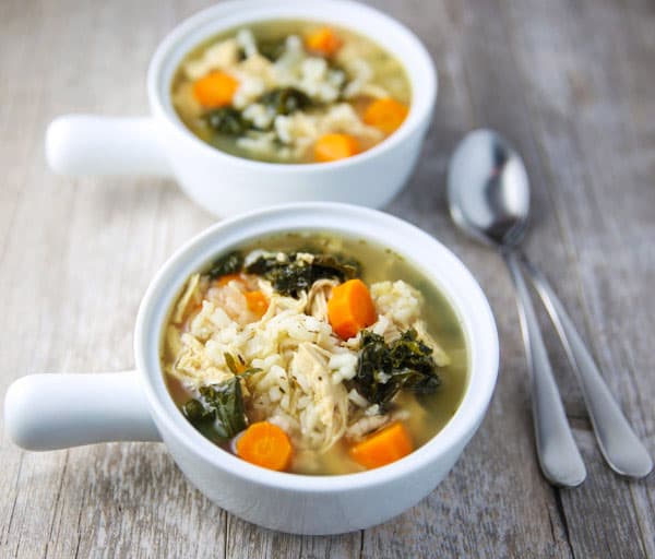 This Slow Cooker Lemon Chicken and Rice Soup with Kale is so healthy, hearty, and savory! This will be your new favorite soup!