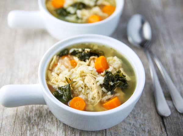 This Slow Cooker Lemon Chicken and Rice Soup with Kale is so healthy, hearty, and savory! This will be your new favorite soup!