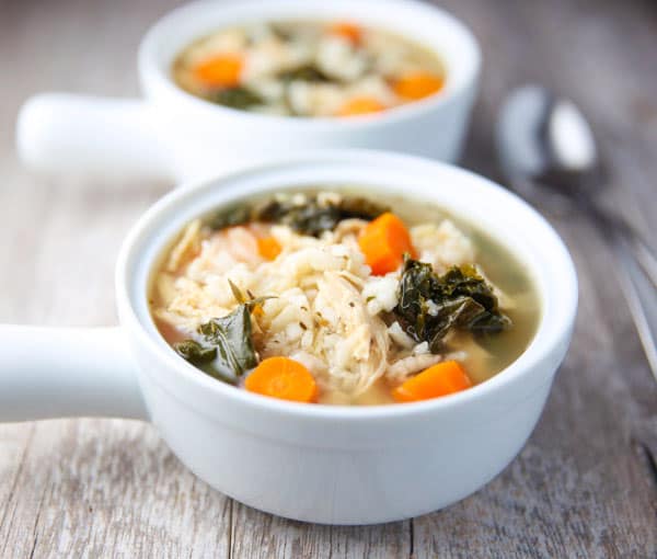 This Slow Cooker Lemon Chicken and Rice Soup with Kale is so healthy, hearty, and savory! This will be your new favorite soup!
